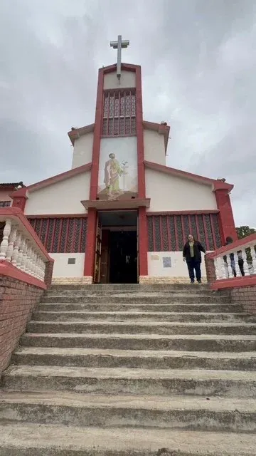 A church at the top of a flight of steps