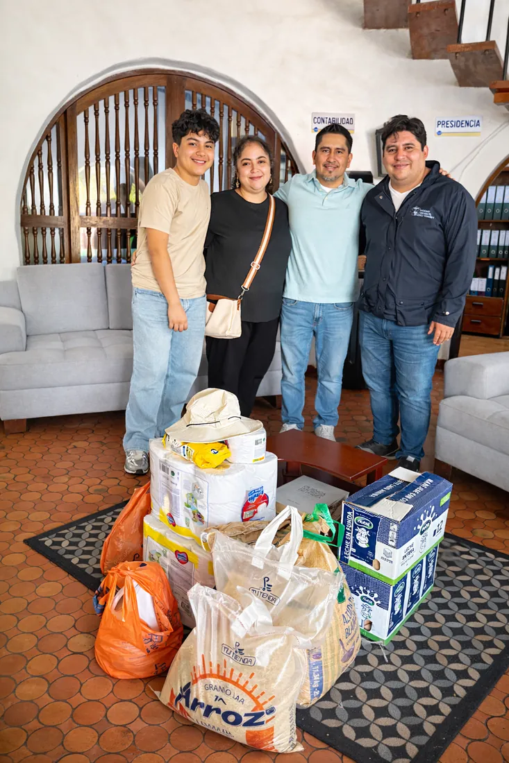 Melissa and Ivan with donations